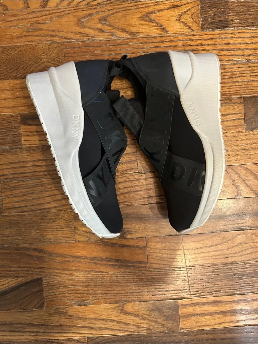 DKNY Black Slip-On Logo-Trim Women’s Sneakers with White Sole
